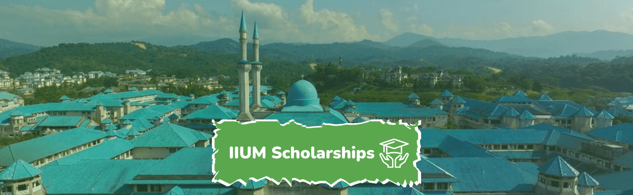 iium campus with a paper cut that carry the words: iium scholarships